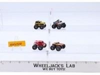Lot of 4 Micro Machines Monster Trucks 1980's Vintage Galoob Super Wheels 4x4