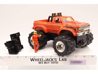 Stomper Crimson Crusher 4x4 Monster Schaper w/ Tow Hook & Figure