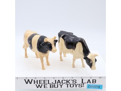 Holstein Bull and Dairy Cow Nylint Corp Vintage Hard Plastic 8" Black and White