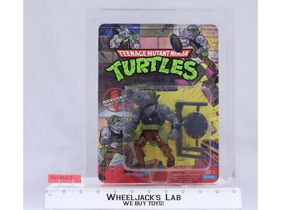 Rocksteady CAS GRADED 80 80/80/95 10-Back TMNT 1988 Playmates Toys Action Figure
