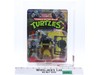 Rocksteady AFA GRADED 80 80/80/85 10-Back TMNT 1988 Playmates NEW SEALED