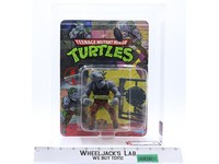Rocksteady AFA GRADED 80 80/80/85 10-Back TMNT 1988 Playmates NEW SEALED