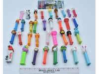 Lot of 36 Pez Candy Dispensers Trucks Hello Kitty Monster's Inc Holiday Garfield