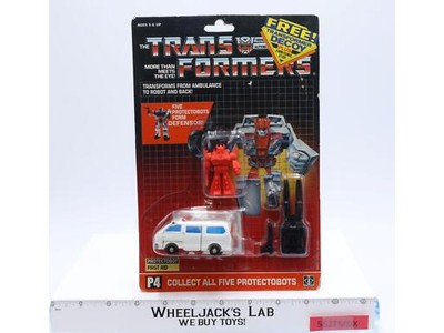 First Aid W/Decoy Protectobot MOSC 1986 Vintage Hasbro G1 Transformers Figure