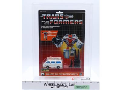 First Aid AFA GRADED 80+ 80/85/85 G1 Transformers 1986 Hasbro NEW SEALED