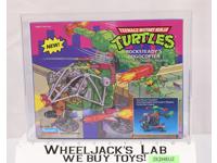 Rocksteady's Pogocopter AFA GRADED 80+ TMNT 1989 Playmates Vehicle NEW SEALED