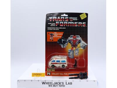 First Aid 100% Complete W/CARDBACK & BUBBLE G1 Transformers Action Figure