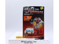 First Aid 100% Complete W/CARDBACK & BUBBLE G1 Transformers Action Figure