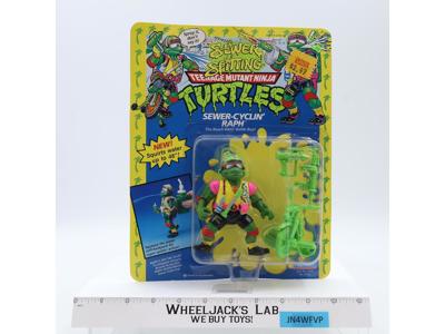 Sewer-Cyclin' Raph Teenage Mutant Ninja Turtles Spitting TMNT Playmates NEW MOSC