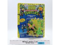 Sewer-Cyclin' Raph Teenage Mutant Ninja Turtles Spitting TMNT Playmates NEW MOSC