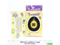 #1800 Yellow & Orange Tamagotchi 1997 Bandai Virtual Reality Pet NEW SEALED
