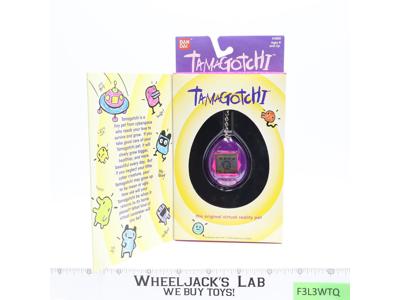 #1800 Purple & Pink Tamagotchi 1997 Bandai Virtual Reality Pet NEW SEALED