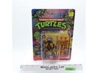 Donatello Teenage Mutant Ninja Turtles 10 Back 1988 Playmates MOSC UNPUNCHED