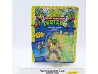 Sewer-Cyclin' Raph Teenage Mutant Ninja Turtle TMNT Playmates UNPUNCHED MOSC