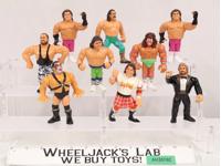 Lot of 9 1990's WWF Hasbro Titan Sports Wrestling Action Figures