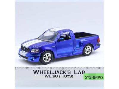 1999 Ford F-150 SVT Lightning Pickup Truck BLUE Diecast 1:24 Jada NM