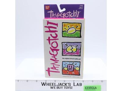 #1800 Translucent Blue Tamagotchi 1997 Bandai Virtual Reality Pet NEW SEALED