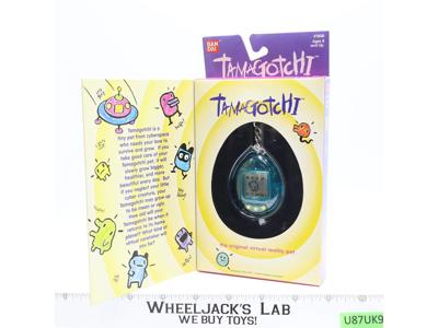 #1800 Translucent Blue Tamagotchi 1997 Bandai Virtual Reality Pet NEW SEALED
