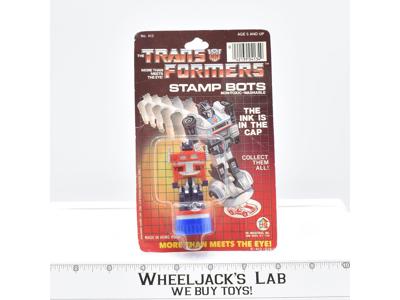 Optimus Prime Stamp Bot NEW G1 Transformers Hasbro Bradley 1985 Vintage