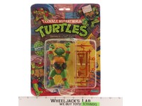 Raphael 10-Back TMNT 1988 Playmates Vintage Action Figure NEW SEALED