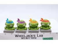 Lot of 4 Character Candy Containers TMNT Teenage Mutant Ninja Turtles 1991