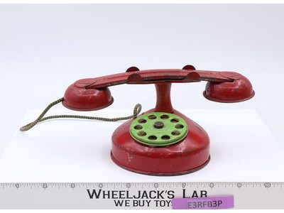 Vintage Tin / metal Toy Rotary Telephone Red Green Childrens Play Phone.
