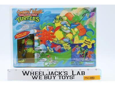 Surfer Leo W/ Mondo Mutant Surfer Tube CAS GRADED 85 85/90/85 TMNT 1994 SEALED