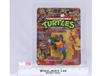 Leatherhead CAS GRADED 85 85/85/90 19-Back TMNT 1989 Playmates Figure