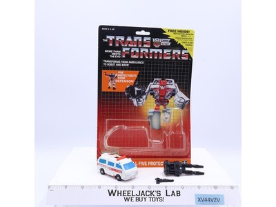 First Aid METAL 100% Complete W/CARDBACK & BUBBLE G1 Transformers Action Figure