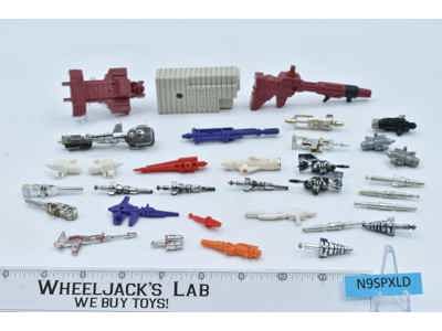 Lot #5 of Accessories Parts Weapons Guns Missiles Vintage G1 Transformers 1984