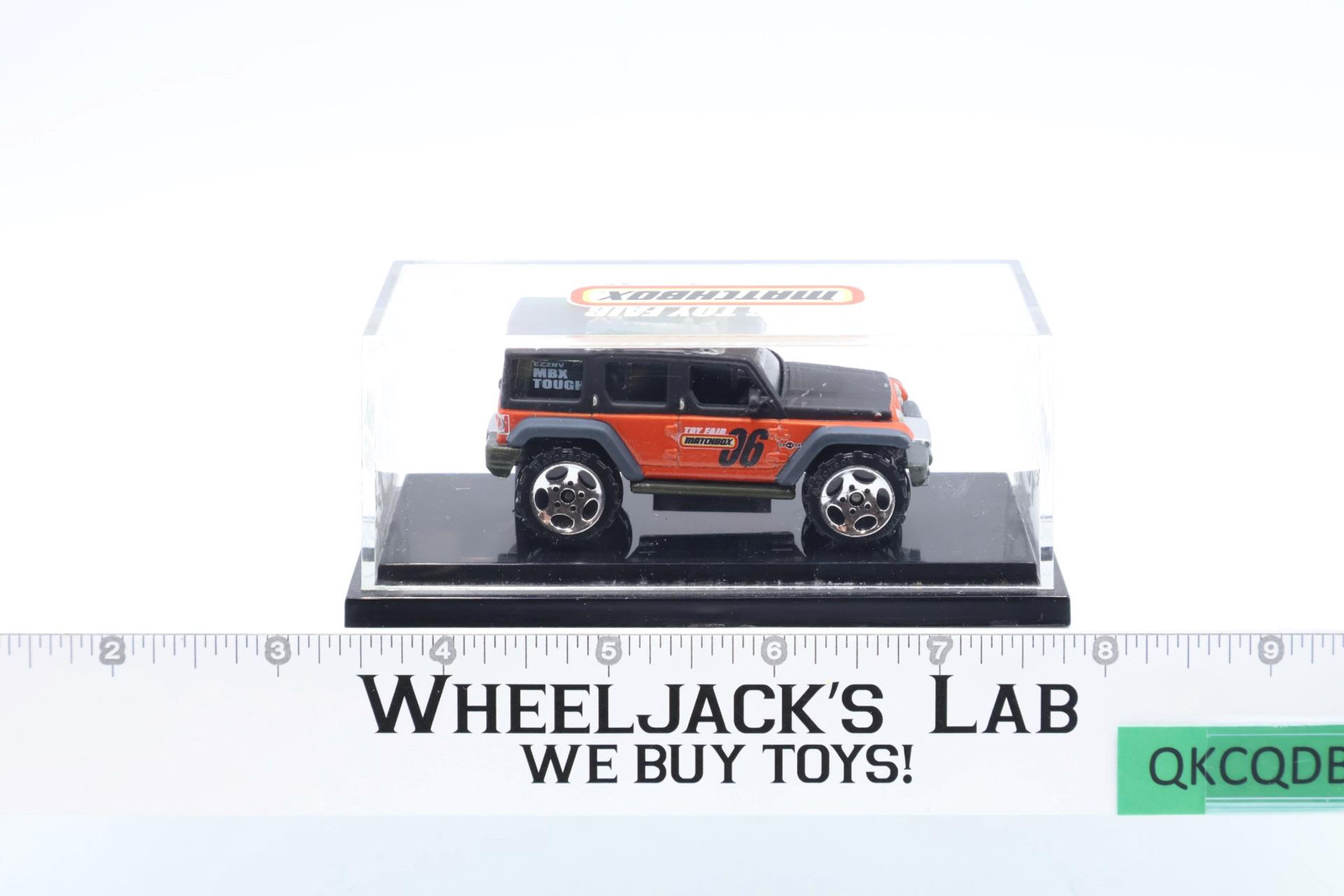 Matchbox 2006 Orange Jeep Ready for Action MBX 2004 Toy Fair in Case NEW