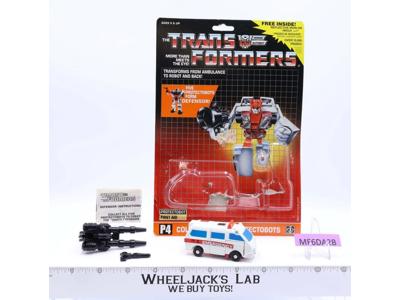 First Aid 100% Complete W/CARDBACK & BUBBLE NR MINT G1 Transformers Vintage