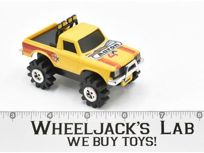 Chevy Luv Yellow 4x4 WORKS Schaper Stomper Rough Riders 1980 Vintage